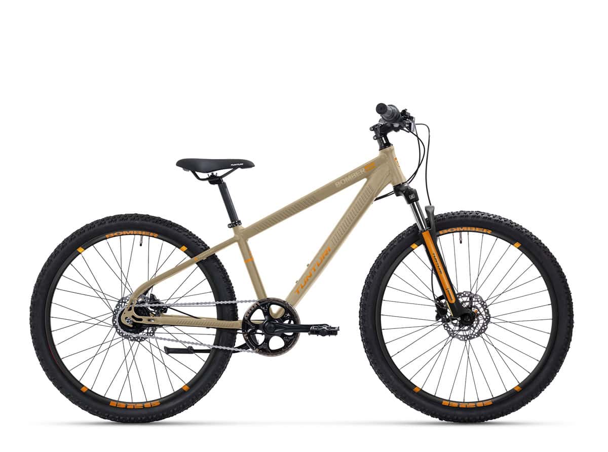 Tunturi bomber beigen värinen nuorten maastopyörä valkoisella taustalla