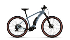 Tunturi vaaleansininen maastopyörä valkoisella taustalla. Ruskeat renkaat.