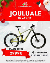 Tunturi vaaleanvihreä täysjousto maastopyörä valkoisella taustalla