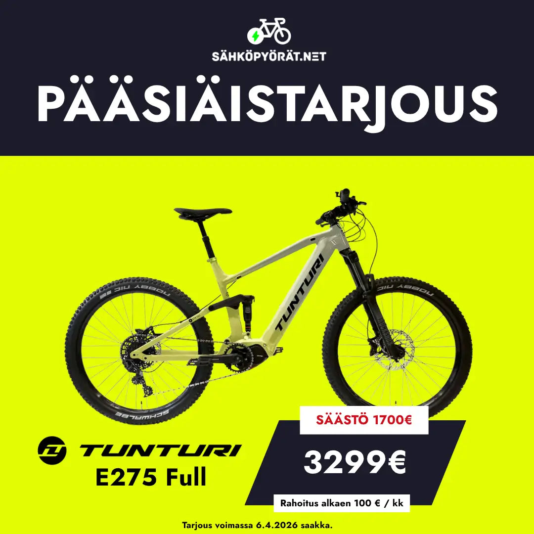 SÄHKÖPYÖRÄT.NETin harmaa Tunturi E275 Full -maastopyörä on esillä keltaisella pohjalla. PÄÄSIÄISTARJOUS: 3299€, säästä 1700€, tai rahoitus alkaen 100€/kk. Tarjous voimassa 6.4.2026 asti.